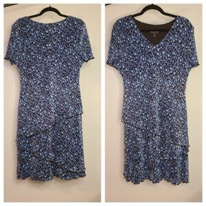 Oval polka dot in blues dress.